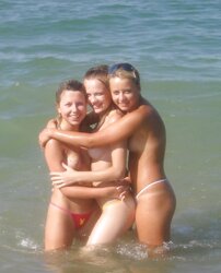 trio teenagers on the beach