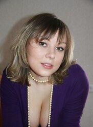 Big-Boobed Woman in Purple