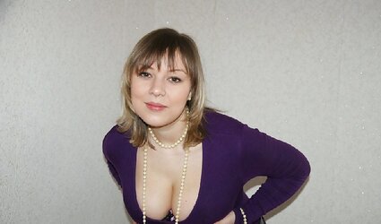 Big-Boobed Woman in Purple