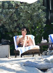 Kate Moss Sunbathes Stripped To The Waist on Vacation in Jamaica