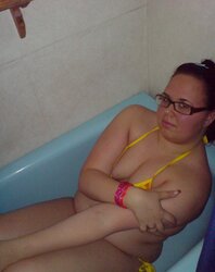 Youthful chubby nymph with glasses
