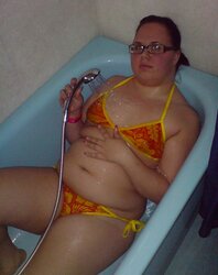 Youthful chubby nymph with glasses