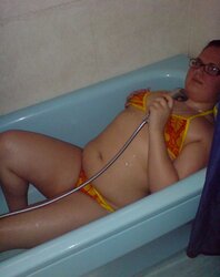 Youthful chubby nymph with glasses