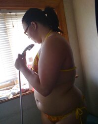 Youthful chubby nymph with glasses