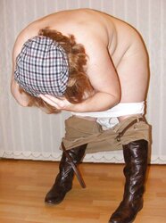 Jodhpurs, footwear and railing whip