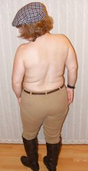 Jodhpurs, footwear and railing whip