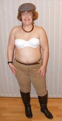 Jodhpurs, footwear and railing whip
