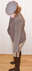 Jodhpurs, footwear and railing whip