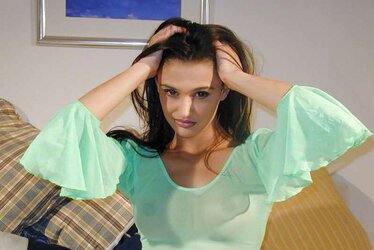 Kavitha sidhu green clothes on sofa