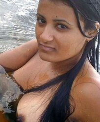Naked indian stunner swimming
