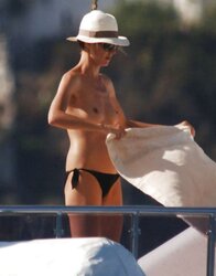 Heidi Klum Fresh Stripped To The Waist Sunbathing on a Yacht