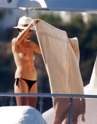 Heidi Klum Fresh Stripped To The Waist Sunbathing on a Yacht