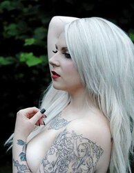 Pretty women with piercing and tatoos