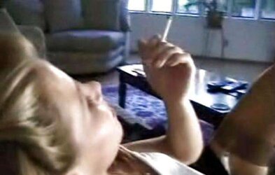 Stacey smoking while deep throating man meat