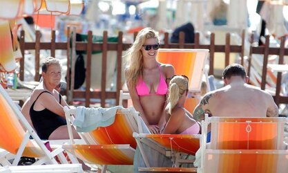 Michelle Hunziker rosy Bathing Suit on the beach in Varigotti