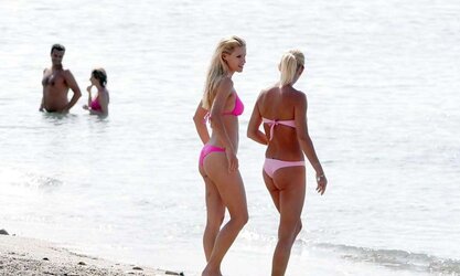 Michelle Hunziker rosy Bathing Suit on the beach in Varigotti