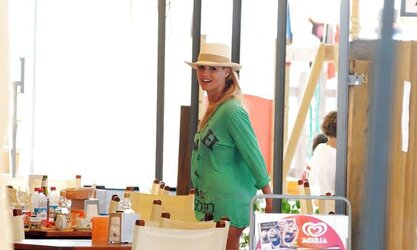 Michelle Hunziker rosy Bathing Suit on the beach in Varigotti