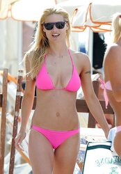 Michelle Hunziker rosy Bathing Suit on the beach in Varigotti