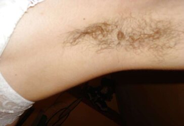 She enjoys to display her fur covered muff and rectum
