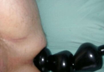 Just playing with a fake penis chain fasten
