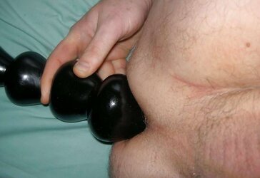 Just playing with a fake penis chain fasten