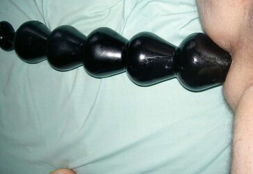 Just playing with a fake penis chain fasten