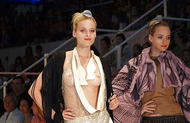 Models a podium downblouse