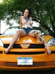 Buxomy Alt Punk Adahlia Thumbs on Taxi Cab