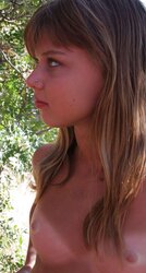 Nude ultra-cute teenager at the woods