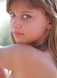 Nude ultra-cute teenager at the woods