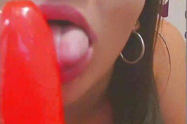 Succulent Doll Playing Her Crimson Fake Penis On Webcam