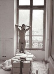 Milla Jovovich downright bare