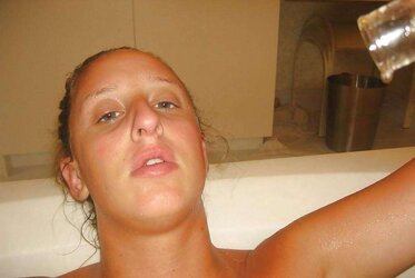HUGE-BOOBED DAME IN TUB