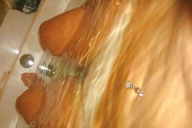 HUGE-BOOBED DAME IN TUB