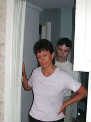 Russian mom Amalia with her son in the kitchen