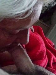 Granny fellates manstick