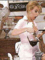 Joanna Storm as waitress obeying her customers