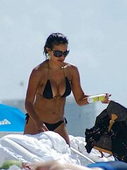 Vida Guerra displays astounding caboose and breasts in panty swimsuit
