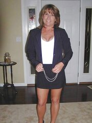 Businesswoman disrobing after work